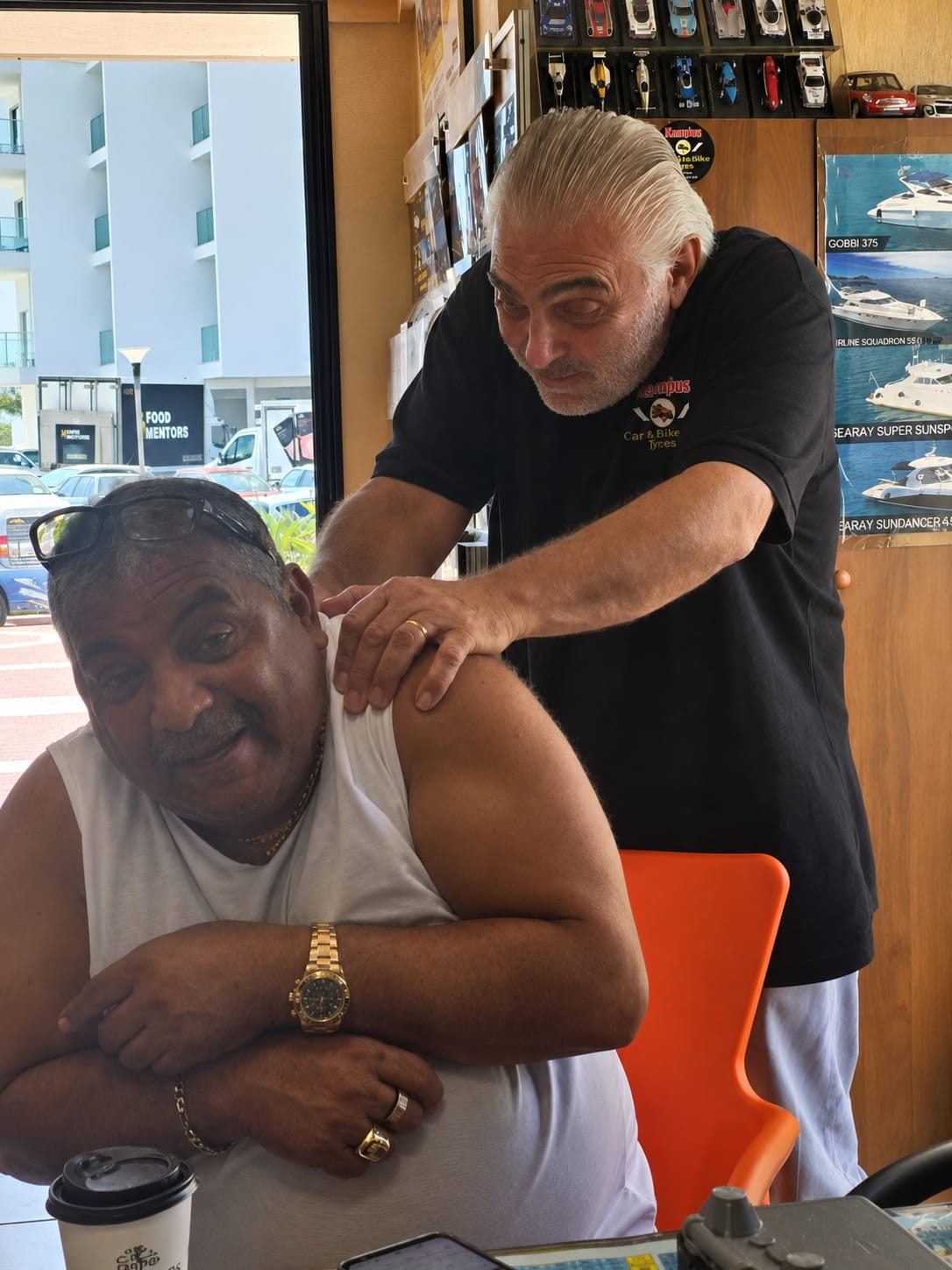 Nikos at the Kannias office with a customer